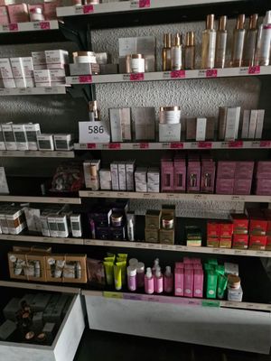 many different types of cosmetics on the shelves in the store