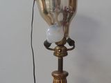 a lamp that is sitting on a wooden table