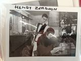 a black and white photo of a man and a woman in a restaurant