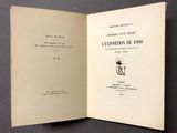 an open book with a picture of a man sitting on a chair