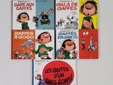 plusieurs livres pour enfants posés sur une surface blanche, avec une balle rouge