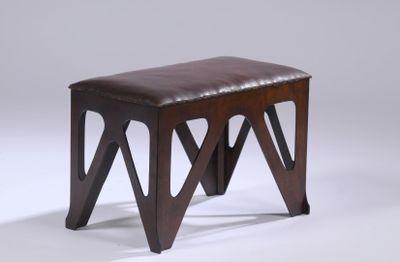 an image of a wooden bench with a leather seat on top of it