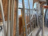 a room with scaffolding and a window in it