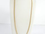 a gold chain necklace on a mannequin mannequin mannequin mannequin mannequin mannequin mannequin mannequin manne