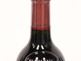 a bottle of wine that is sitting on a table