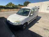 a picture of a white van parked in a parking lot