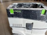 a black and white box with a green label on it