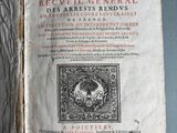 an old book with a picture of a cat on it