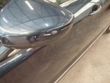 a close up of a car ' s side view mirror