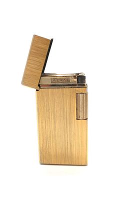 Un briquet SAROME plaqué or H. : 6cm