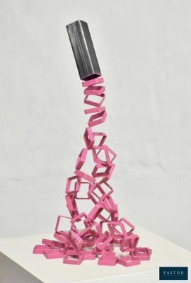 a pink sculpture on a white pedestal with a black top