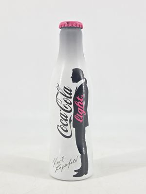 a bottle of coca cola with a man in a tuxedo on it