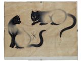deux chats assis côte à côte par terre