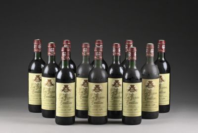six bouteilles de vin alignées sur une table