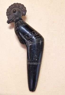 an image of a wooden figurine of a woman