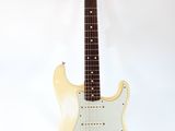 an electric guitar with a stand on a white background