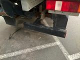a close up of the back end of a flatbed truck