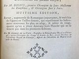 un livre avec un titre posé sur une table