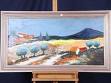 un tableau posé sur un chevalet, avec au premier plan un tableau représentant des moutons