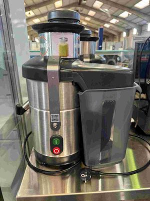 a blender sitting on top of a counter in a kitchen