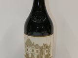a bottle of wine that is sitting on a table