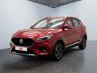a red 2020 mgx suv parked in a showroom