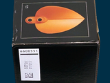a box that has a knife in it on a table