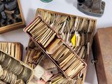 a box full of old books and other items on a table