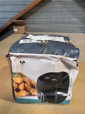 a box of fried chicken sitting on a table