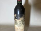 a bottle of wine that is sitting on a table