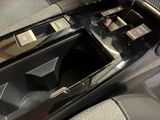 a close up of a car ' s center console