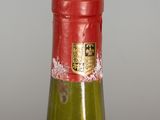 a bottle of wine that is sitting on a table