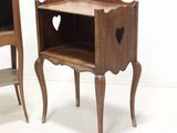 two wooden tables with a heart cut out on the top