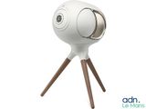 an image of a white camera sitting on top of a wooden tripod