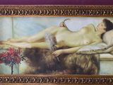 painting of a nude woman laying on a couch with a dog