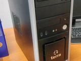 a desktop computer sitting on a desk next to a laptop