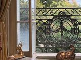 an image of a living room with a view of the eiffel tower