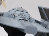 a model of a star wars tier that is on display