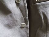 a close up of a jacket with a logo on it