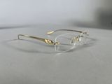 a close up of a pair of glasses sitting on top of a table