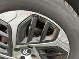 a close up of a tire on a vehicle