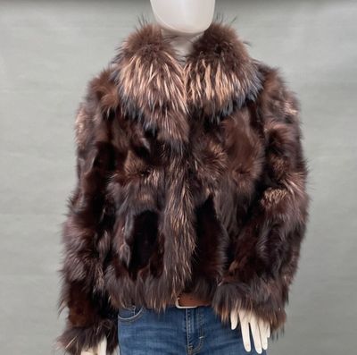 the mannequin is wearing a brown fur coat and jeans