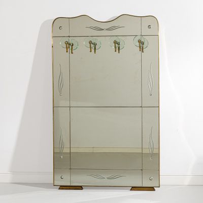 an image of a mirror with a bunch of keys hanging on it