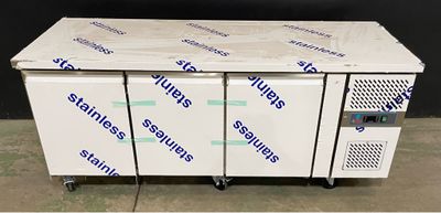 a close up of a freezer sitting on top of a floor
