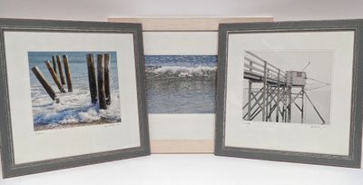 two framed pictures of a pier and a body of water