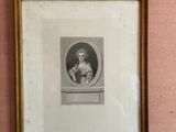 a picture of a picture of a woman in a picture frame on the wall