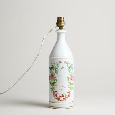 Bouteille à une anse en porcelaine à décor polychrome de fle…