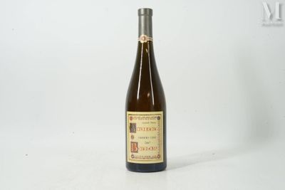 a bottle of wine that is sitting on a table