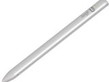 un gros plan d'un stylo blanc sur lequel est posé un marqueur vert
