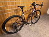 a bike leaning against a wall in a room